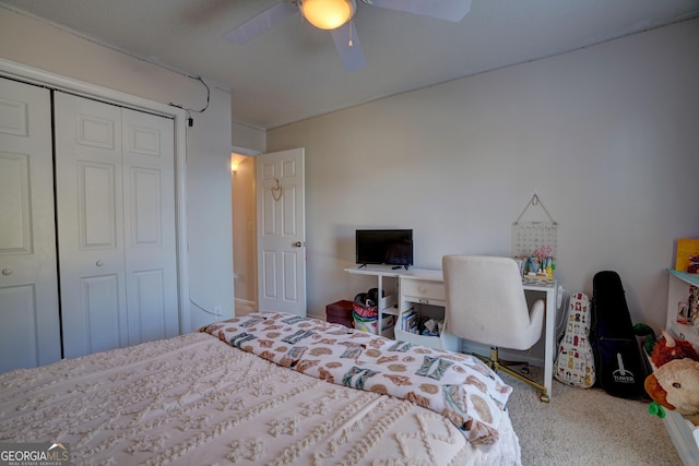 bedroom with ceiling fan and a closet