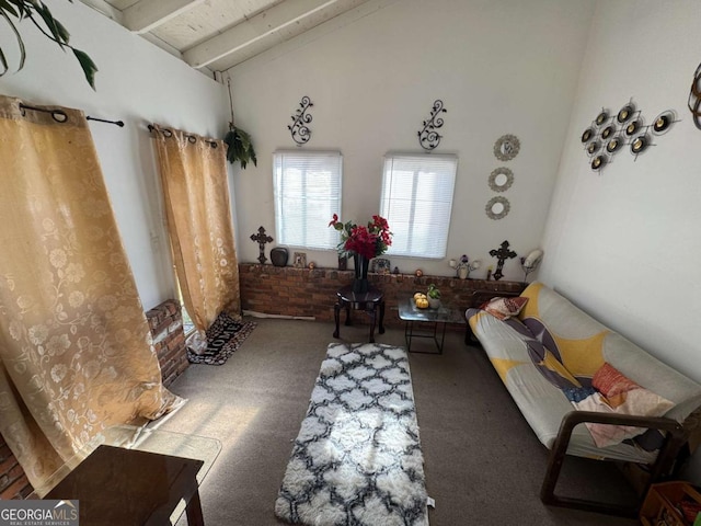 interior space with vaulted ceiling with beams