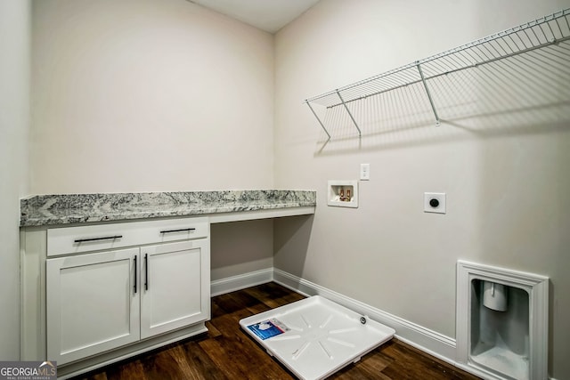 laundry room featuring washer hookup, cabinets, dark hardwood / wood-style floors, and hookup for an electric dryer