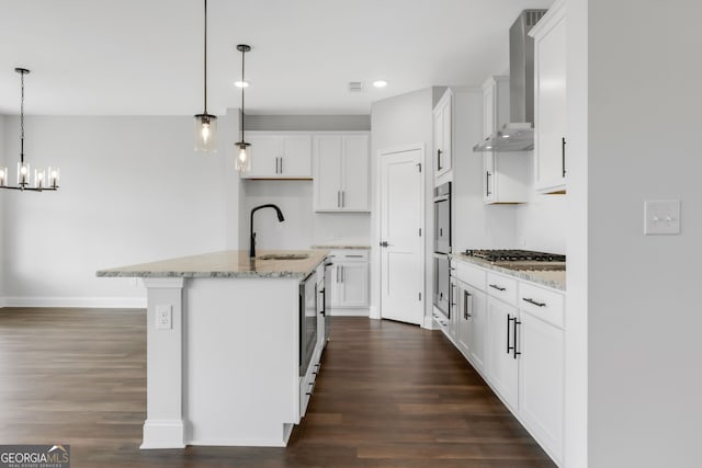 39 Pecan Ct, Hoschton, GA 30548 - kitchen featuring a sink, wall chimney range hood, dark wood-style flooring, appliances with stainless steel finishes, and recessed lighting