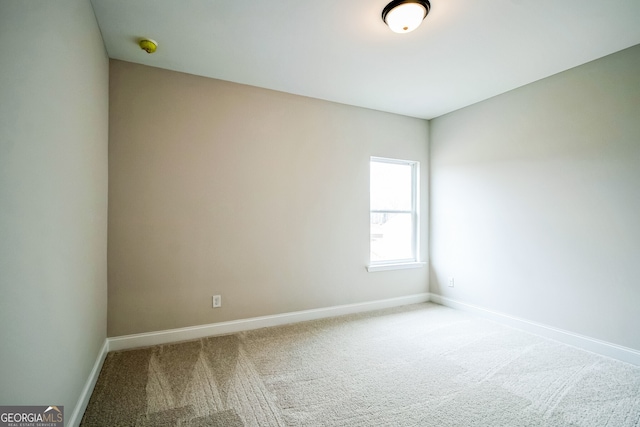 view of carpeted spare room