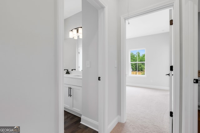 39 Pecan Ct, Hoschton, GA 30548 - corridor with baseboards and dark colored carpet