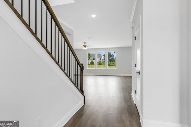 39 Pecan Ct, Hoschton, GA 30548 - corridor with baseboards, stairs, wood finished floors, and recessed lighting