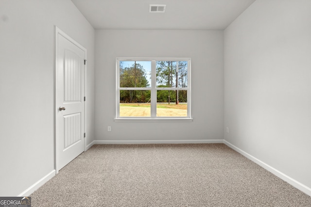 view of carpeted spare room