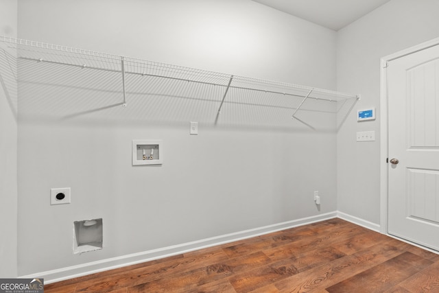 laundry room with hookup for an electric dryer, dark hardwood / wood-style flooring, and hookup for a washing machine