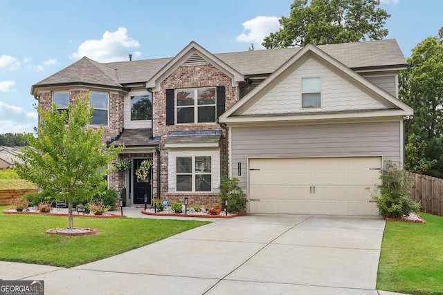 craftsman inspired home featuring a garage and a front lawn