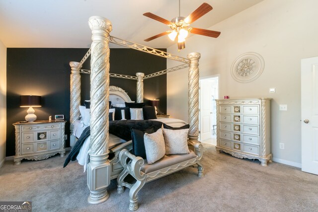 bedroom featuring ceiling fan, high vaulted ceiling, and carpet