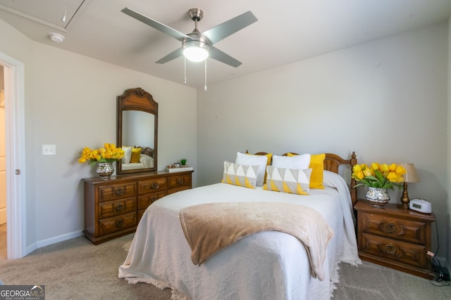 carpeted bedroom with ceiling fan