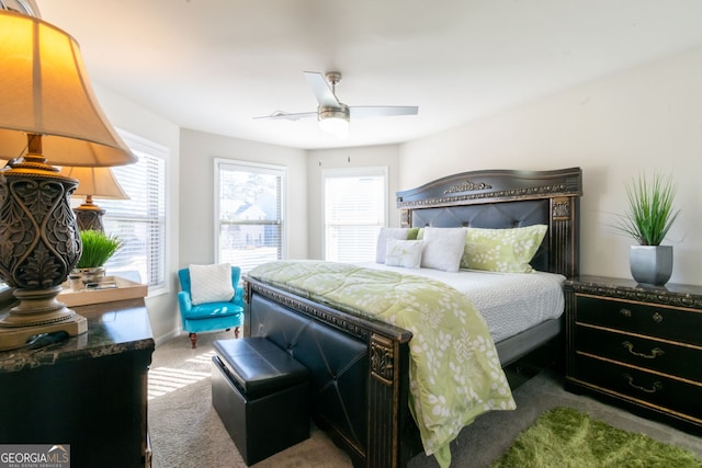 bedroom with ceiling fan and carpet