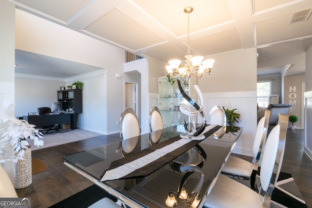 dining area featuring coffered ceiling, dark hardwood / wood-style floors, crown molding, and an inviting chandelier