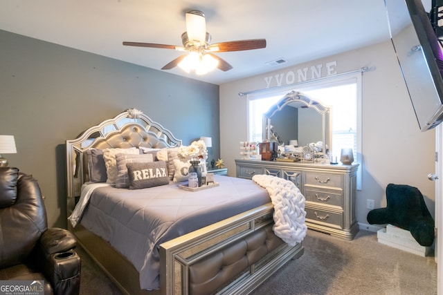 bedroom with ceiling fan and carpet floors