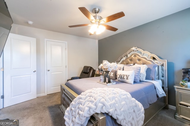 bedroom with dark carpet and ceiling fan