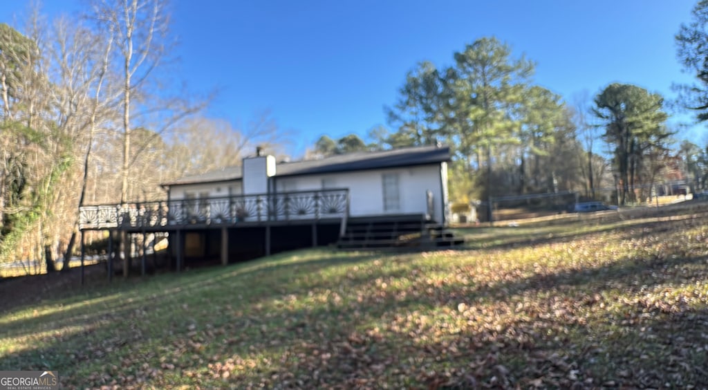 view of yard featuring a deck