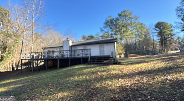 view of yard featuring a deck