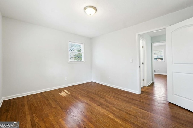 6467 Joanna St, Lithia Springs, GA 30122 - unfurnished room with wood finished floors and baseboards