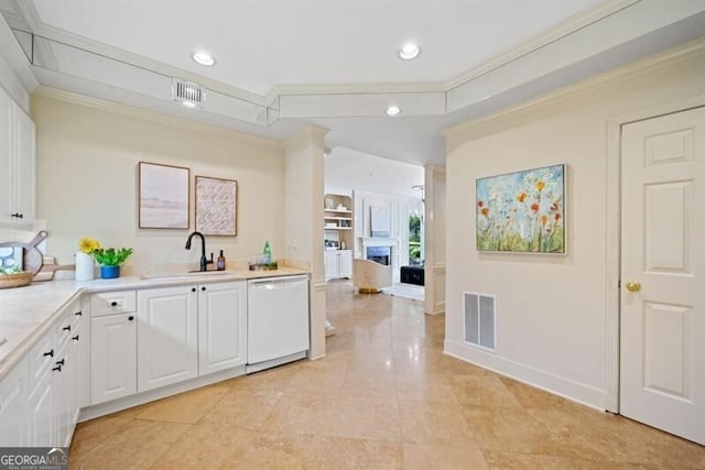 kitchen with white cabinetry, sink, ornamental molding, light tile patterned floors, and white dishwasher