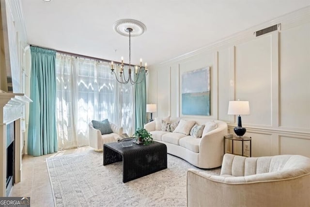 tiled living room featuring an inviting chandelier