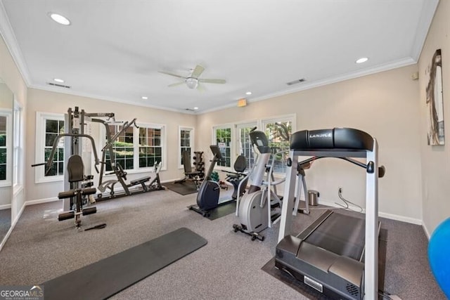 workout area featuring ornamental molding and ceiling fan