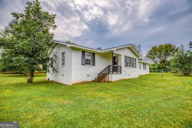 exterior space featuring a yard