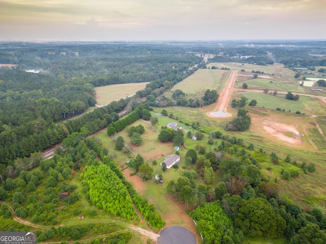 birds eye view of property featuring a rural view