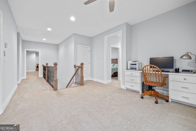 office space with light colored carpet and ceiling fan