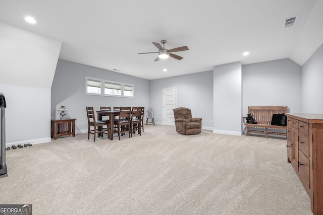 interior space with ceiling fan and lofted ceiling