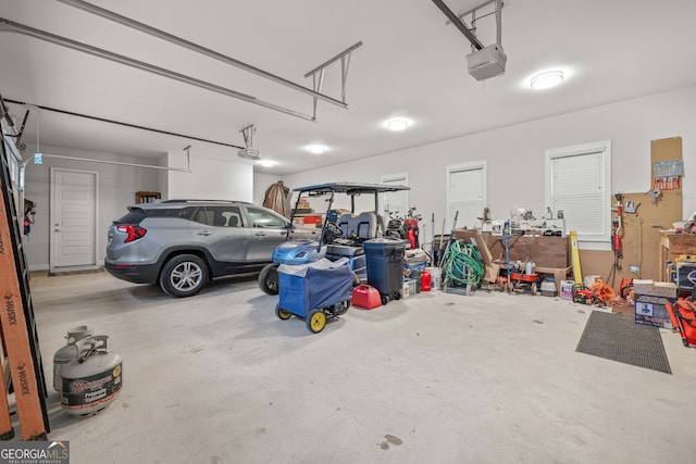 garage featuring a garage door opener