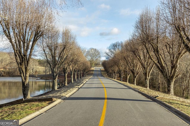 view of road with a water view