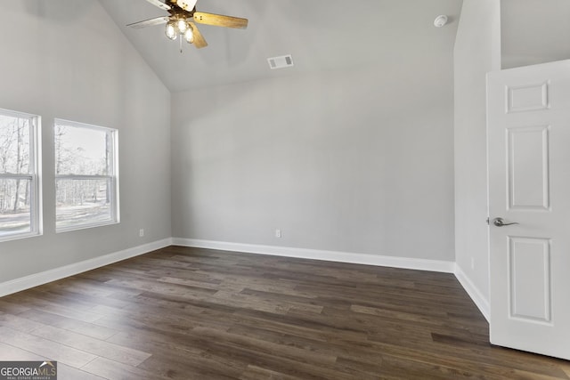 unfurnished room featuring ceiling fan, high vaulted ceiling, and dark hardwood / wood-style flooring