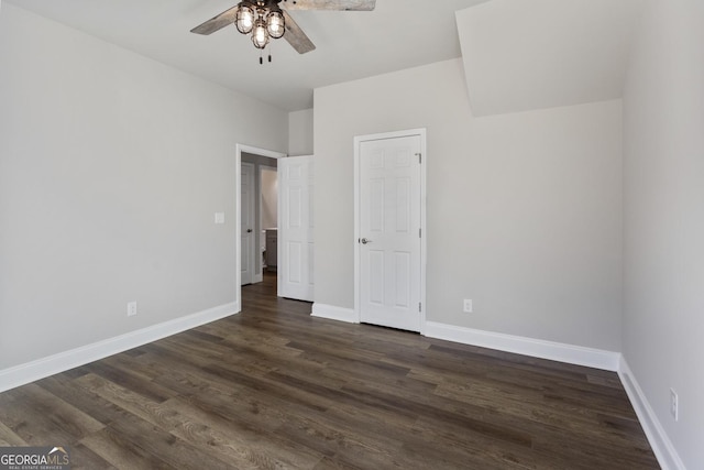 unfurnished bedroom with dark wood-type flooring and ceiling fan