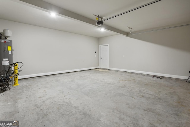 garage featuring a garage door opener and electric water heater