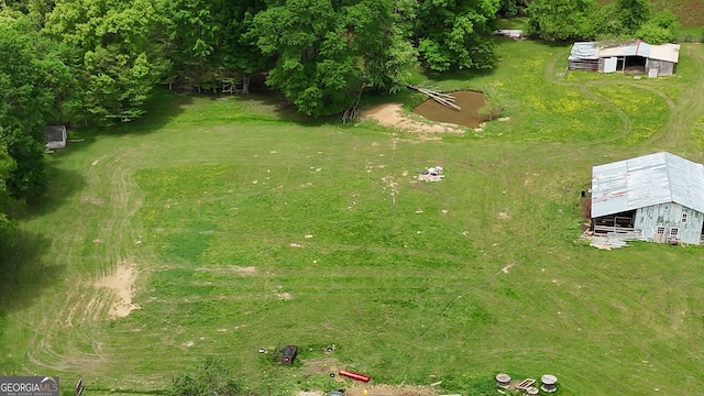 481 Fairview Rd NW, Calhoun, GA 30701 - view of shed featuring fence