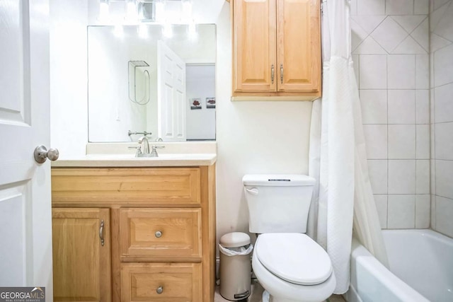 full bathroom with shower / bathtub combination with curtain, vanity, and toilet