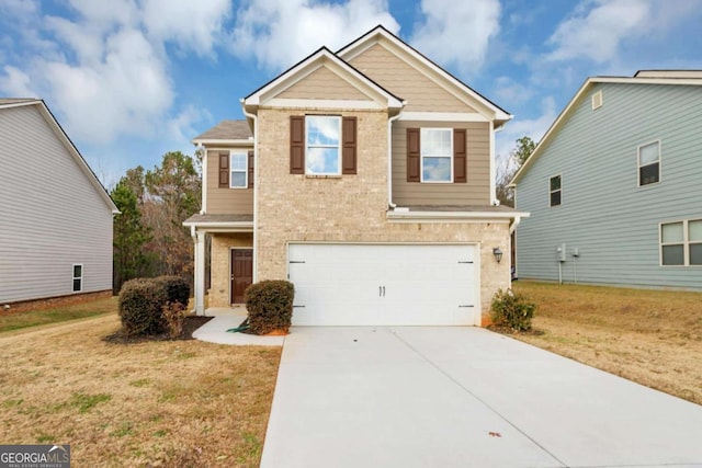 view of front of house featuring a garage and a front yard