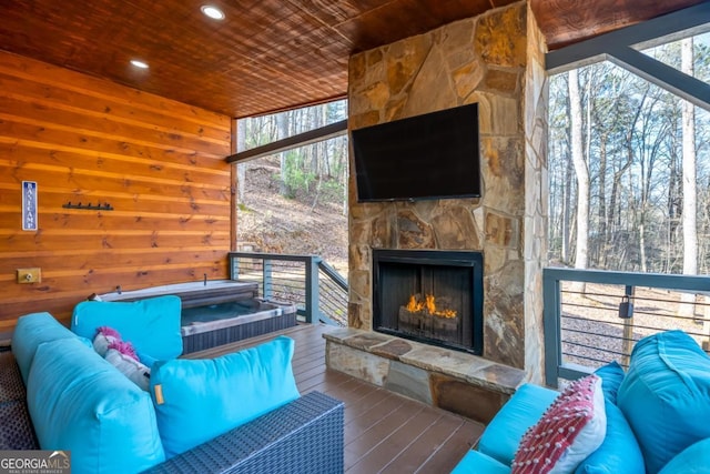 exterior space featuring an outdoor living space with a fireplace