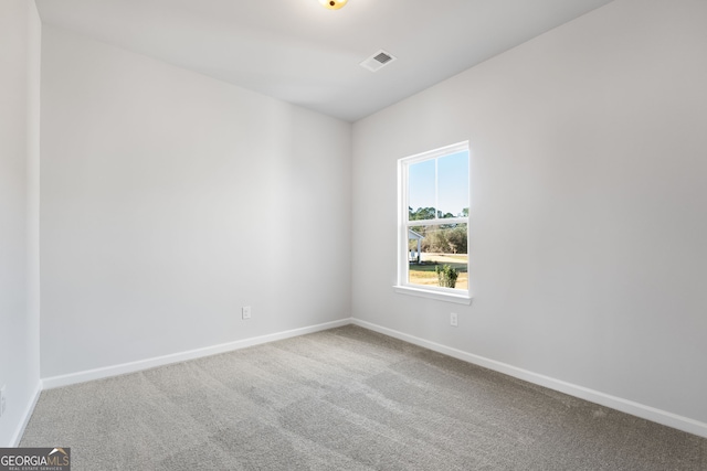 empty room featuring carpet floors