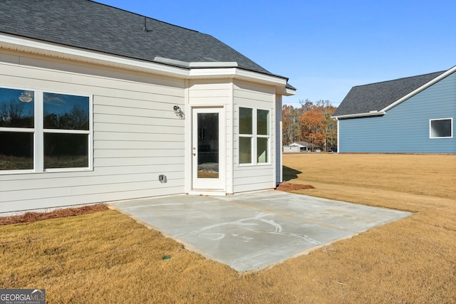 exterior space featuring a yard and a patio area