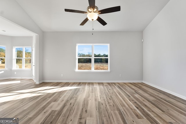 spare room featuring ceiling fan and light wood-type flooring