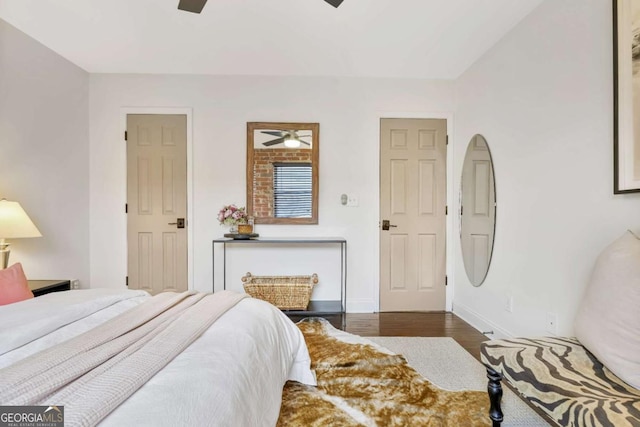 bedroom featuring ceiling fan and dark hardwood / wood-style flooring