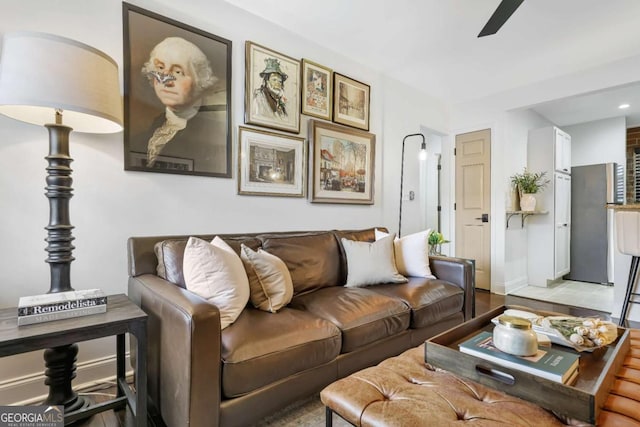 living room with ceiling fan