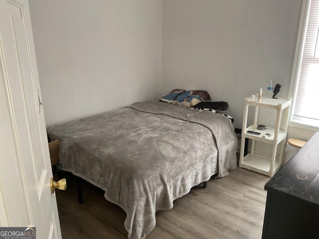 bedroom featuring light hardwood / wood-style floors