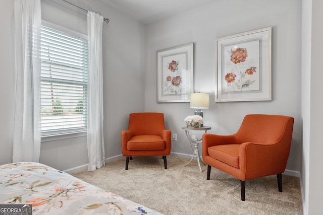 bedroom featuring light colored carpet