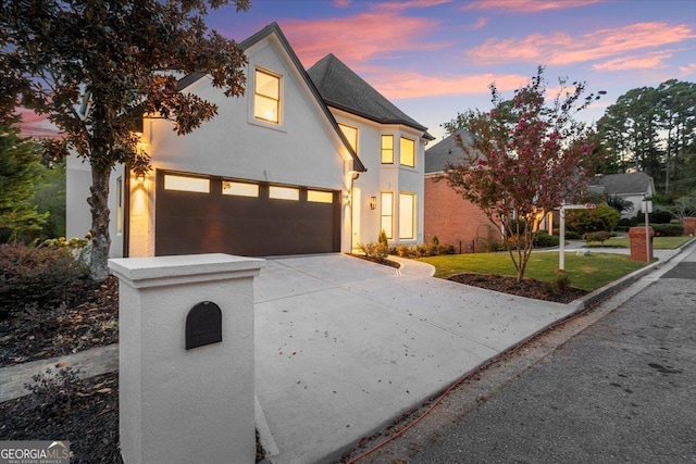 view of front of property with a garage