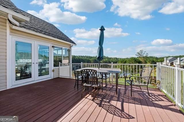 wooden terrace featuring french doors