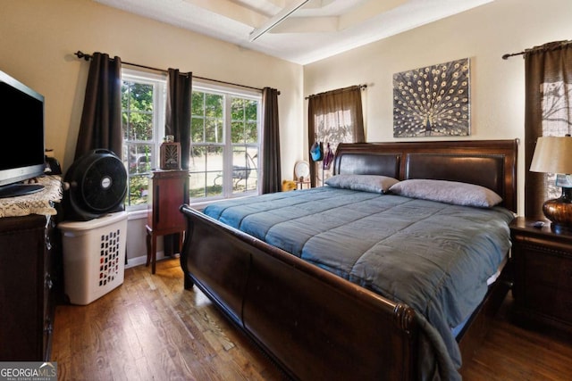 bedroom with wood-type flooring