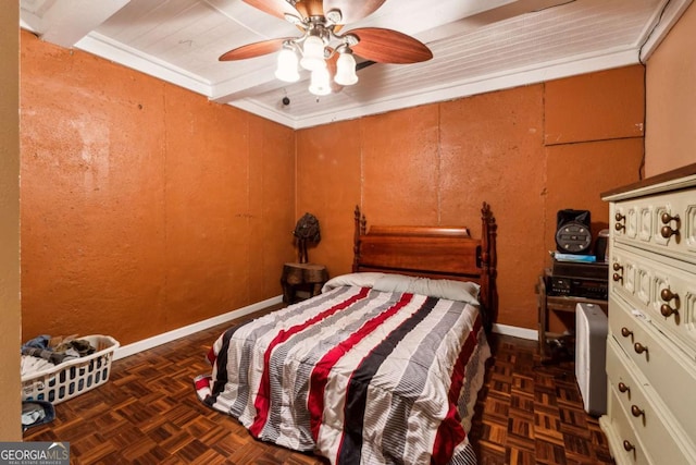 bedroom with ceiling fan and dark parquet floors