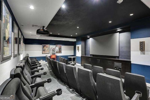 home theater room featuring light carpet