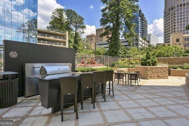 view of patio featuring area for grilling and central AC unit