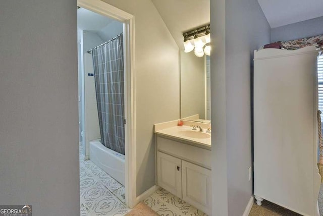 bathroom featuring vanity and shower / bath combo