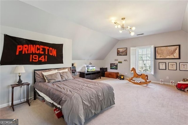 bedroom featuring an inviting chandelier, carpet floors, and vaulted ceiling